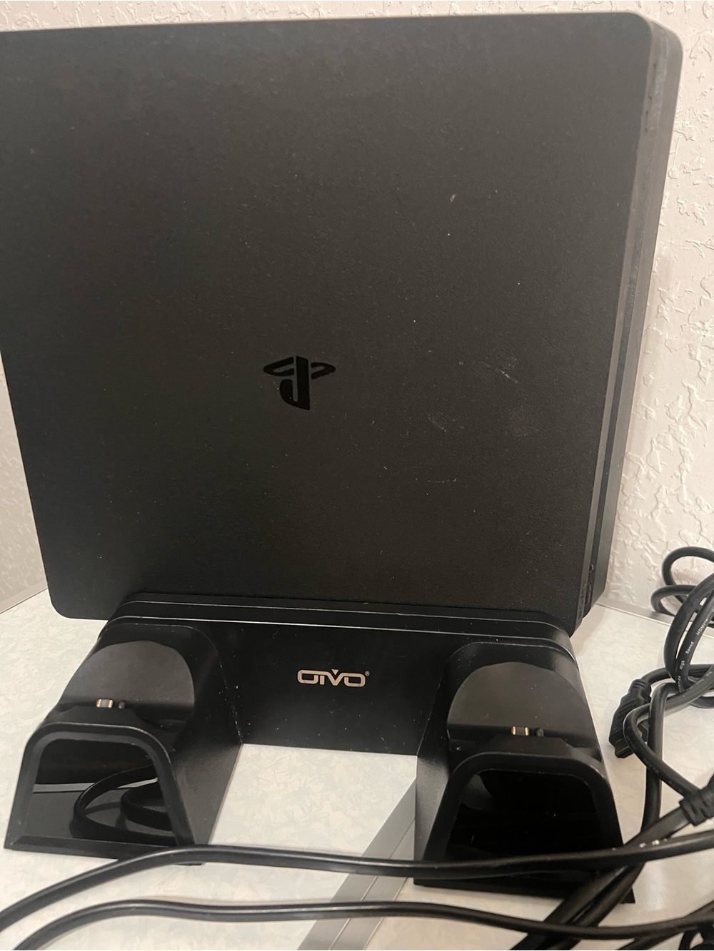 Sony Black PlayStation Slim Console with Black Controller Charger Stand